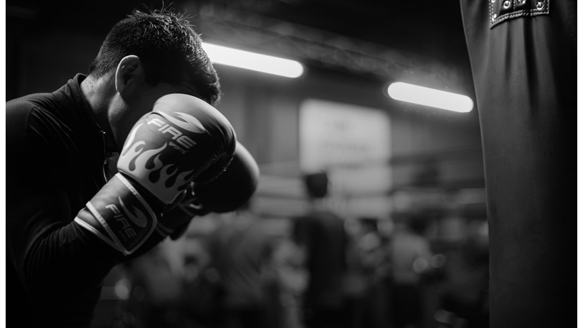 Boxer focused before striking the heavy bag